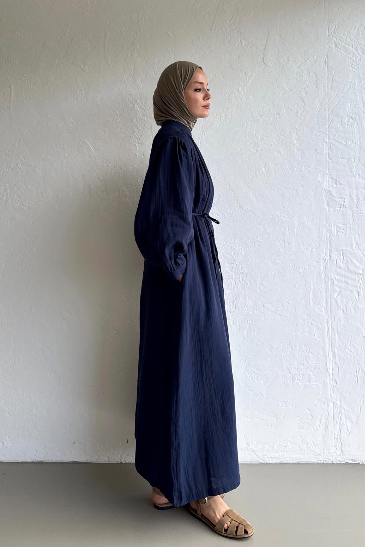 Musselin-Kleid mit seitlichen Taschen