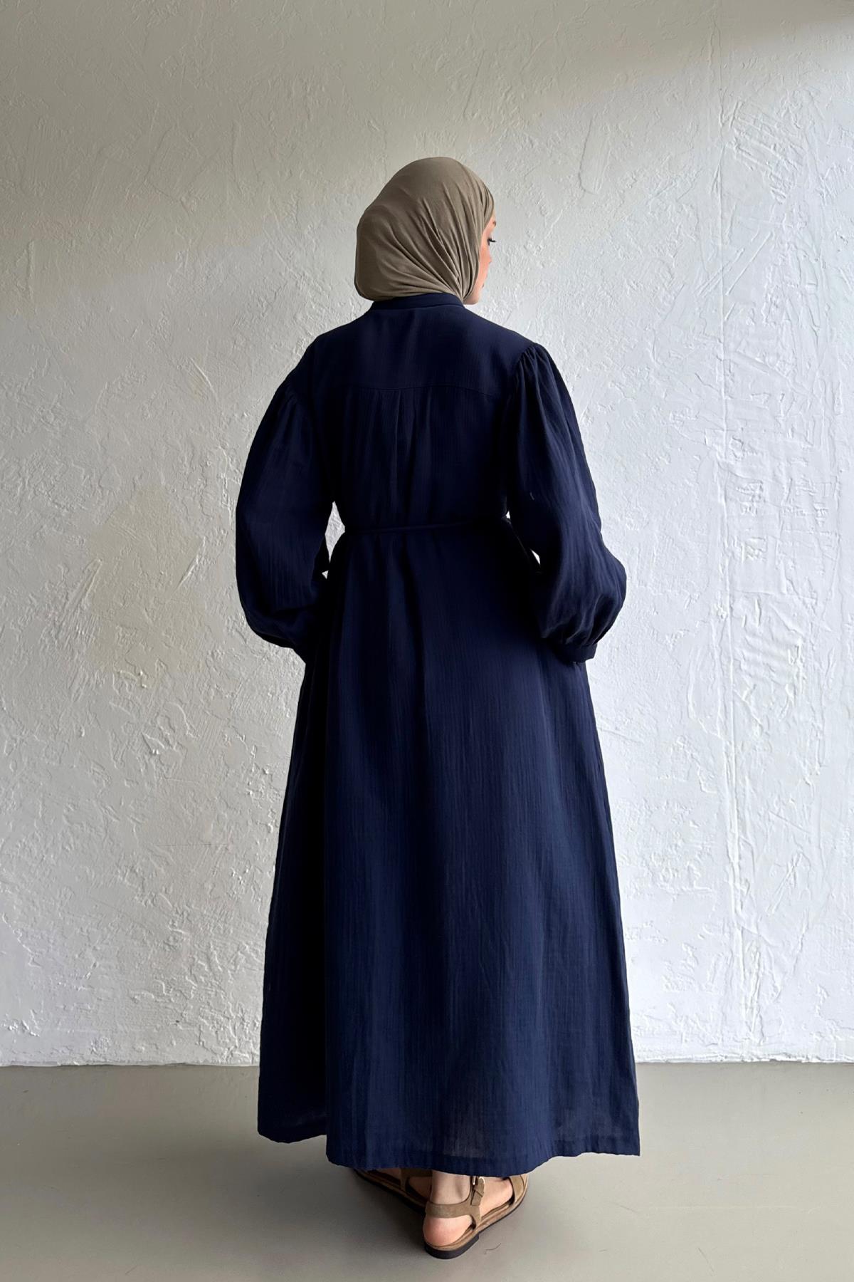 Musselin-Kleid mit seitlichen Taschen